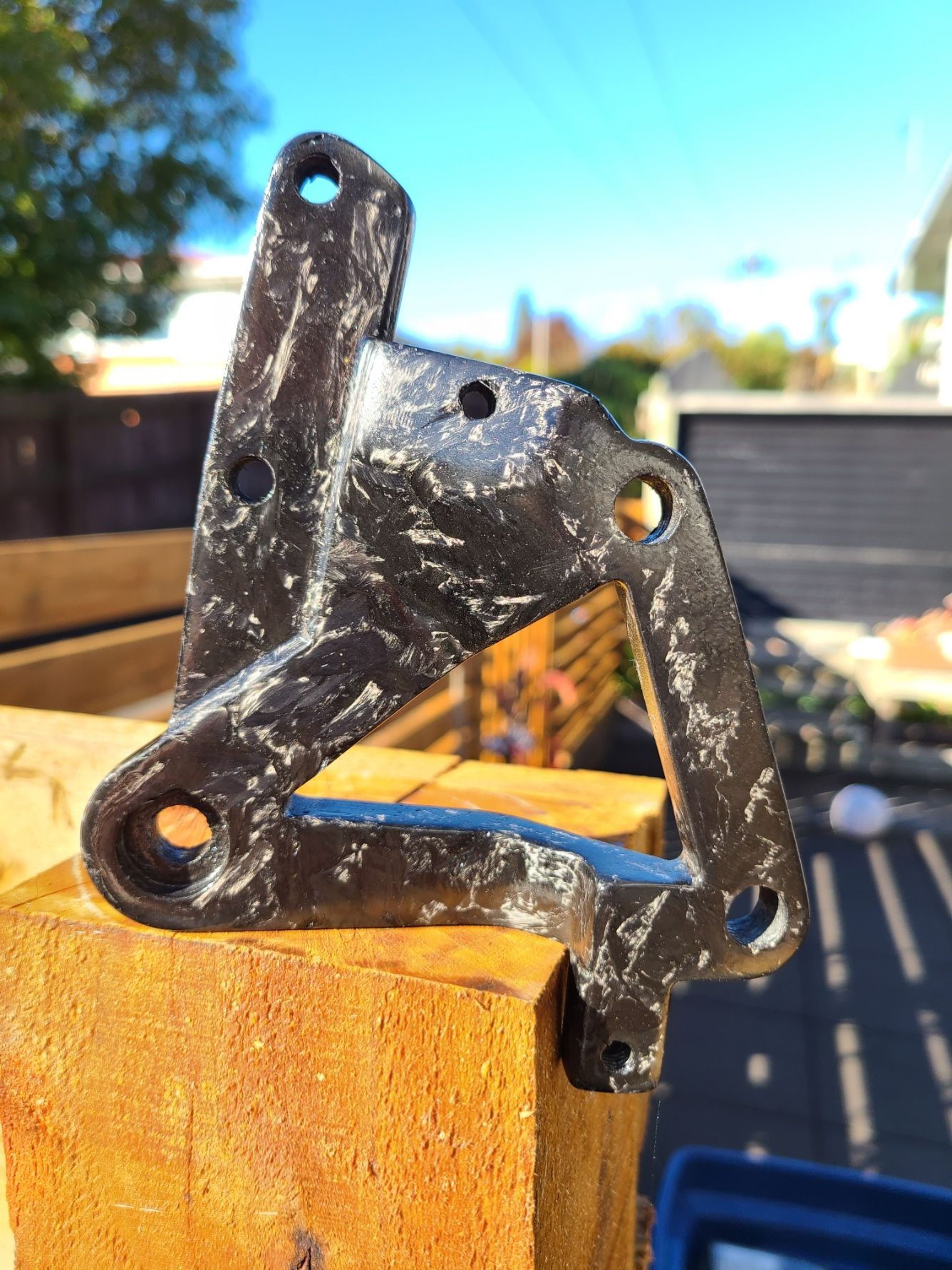 Replacement forged carbon fibre motorbike brake stay
