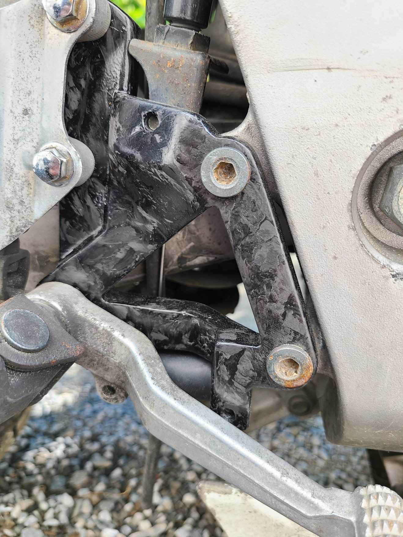 Replacement forged carbon fibre motorbike brake stay